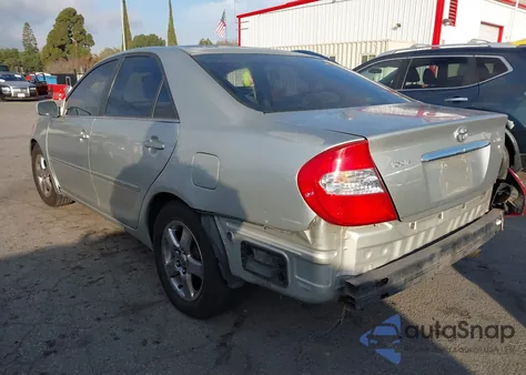 2004 Toyota Camry Xle z USA, uszkodzony, nr VIN JTDBE32K440263589